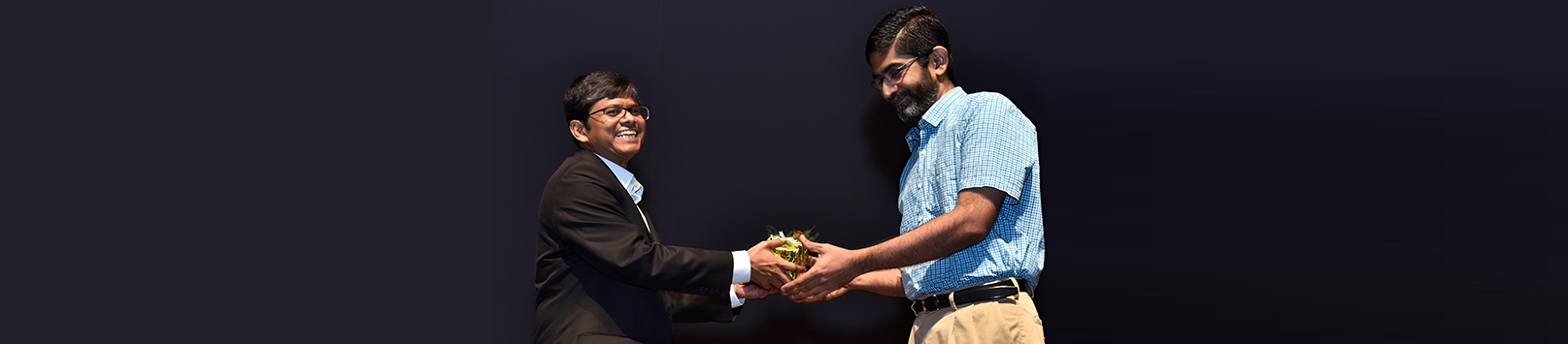 Prof Balram Avittathur being felicitated on his 25th year of service with the Institute by Prof Sahadeb Sarkar, Director-in-Charge, IIM Calcutta